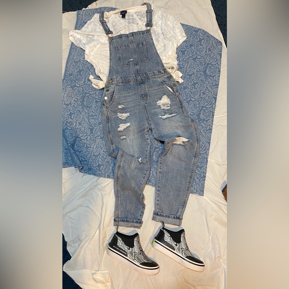 Blue Cropped Denim Jumpsuit with Distressed Details